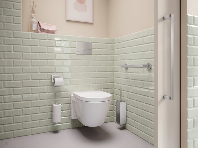 WC area equipped with toilet brush holder, toilet roll holder and grab rail in matt stainless steel